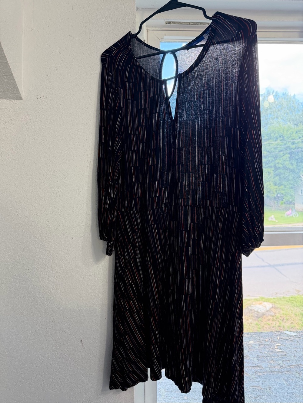 Women's Black Long Sleeve Keyhole Shift Dress with Subtle Stripe Detail